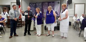 Canadian Royal Purple BC, presenting a cheque for $3100.00. Funds were raised via the “walk around the block for brain injury” 2019 campaign to NBIA Board President Mr. Doug Jones.